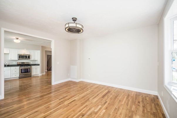 Empty room, Interior, Kitchen, Stainless Steel Appliances, Wood Texture Flooring