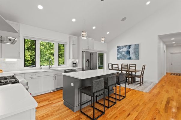 Dining room, Interior, Kitchen, Pendant Lights, Recessed Lighting, Stainless Steel Appliances, Wood Texture Flooring