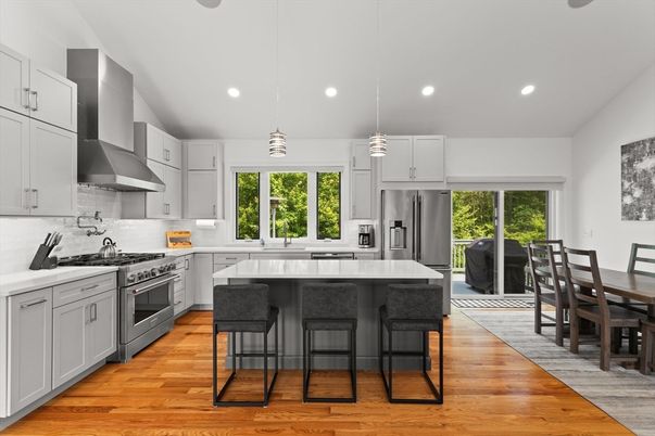 Dining room, Interior, Kitchen, Pendant Lights, Recessed Lighting, Stainless Steel Appliances, Wood Texture Flooring