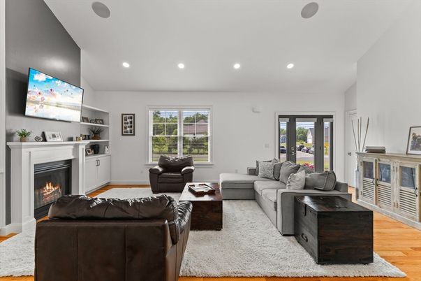 Fireplace, Interior, Living room, Recessed Lighting, Wood Texture Flooring