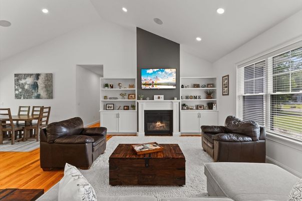 Dining room, Fireplace, Interior, Living room, Recessed Lighting, Wood Texture Flooring
