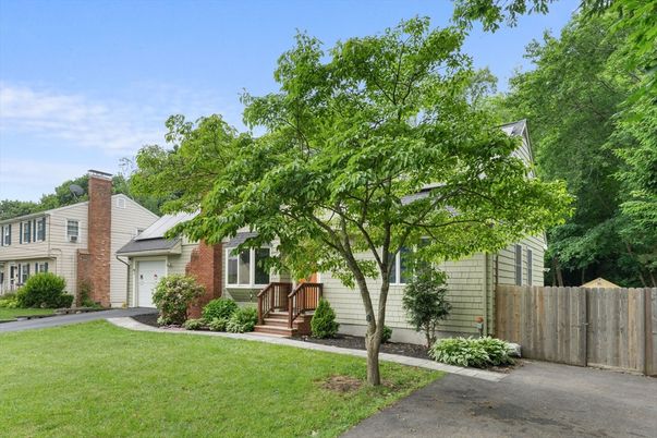 Attached, Backyard, Exterior, Facade, Brick Facade, Solar Panels, Cape Cod