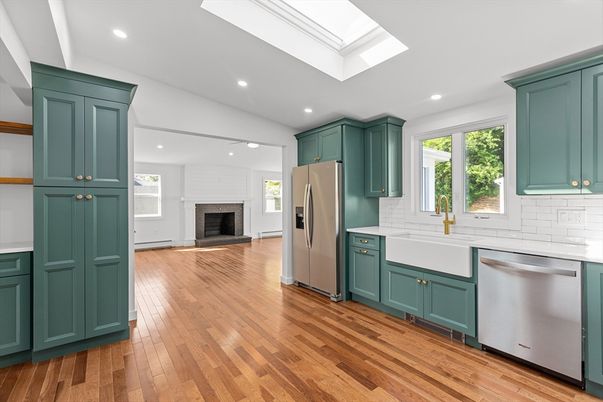 Fireplace, Interior, Kitchen, Recessed Lighting, Stainless Steel Appliances, Wood Texture Flooring