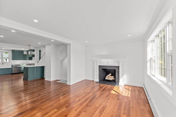 Empty room, Fireplace, Interior, Kitchen, Pendant Lights, Recessed Lighting, Wood Texture Flooring