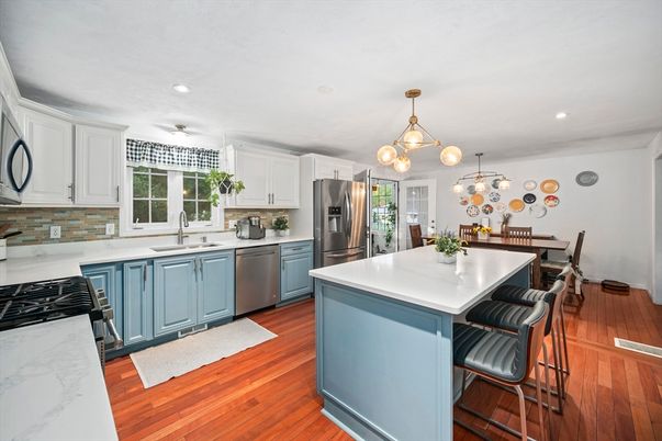 Dining room, Interior, Kitchen, Pendant Lights, Recessed Lighting, Stainless Steel Appliances, Wood Texture Flooring