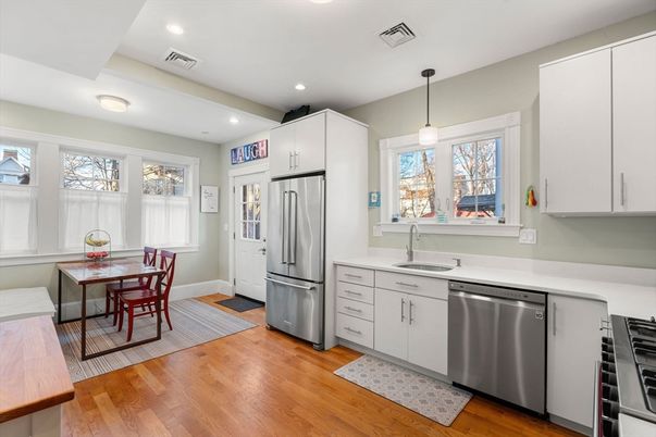 Dining room, Interior, Kitchen, Pendant Lights, Recessed Lighting, Stainless Steel Appliances, Wood Texture Flooring