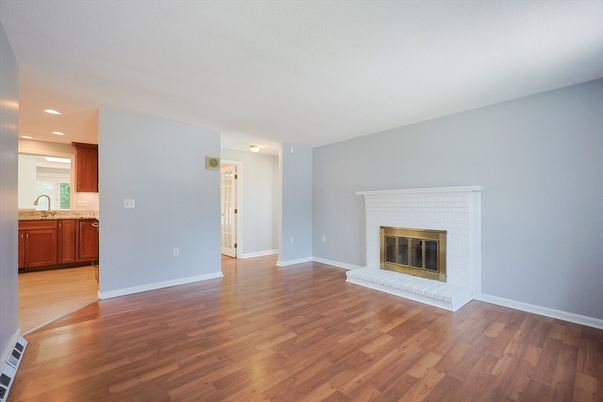 Empty room, Fireplace, Interior, Kitchen, Recessed Lighting, Wood Texture Flooring