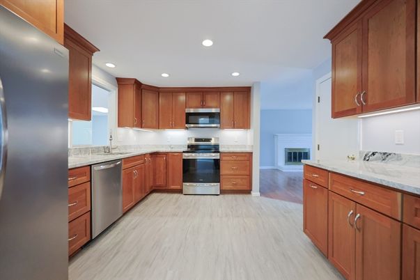 Fireplace, Interior, Kitchen, Marble, Recessed Lighting, Stainless Steel Appliances, Wood Texture Flooring