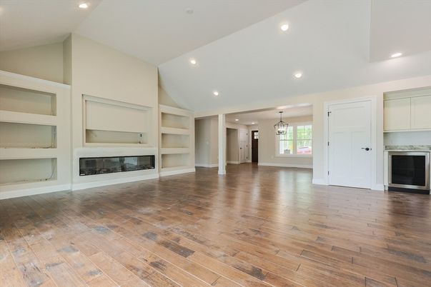 Empty room, Fireplace, Interior, Pendant Lights, Recessed Lighting, Wood Texture Flooring
