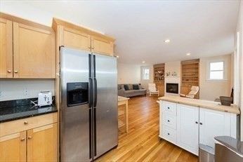 Fireplace, Interior, Kitchen, Living room, Recessed Lighting, Stainless Steel Appliances, Wood Texture Flooring