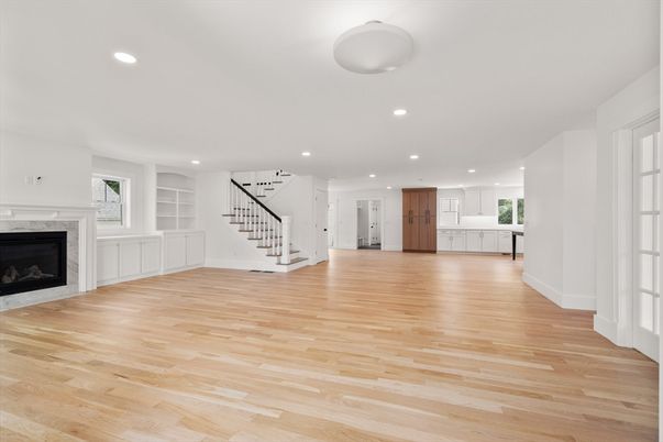 Empty room, Fireplace, Interior, Kitchen, Recessed Lighting, Wood Texture Flooring