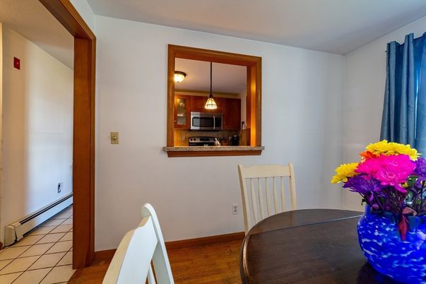 Dining room, Interior, Kitchen, Pendant Lights, Stainless Steel Appliances, Wood Texture Flooring