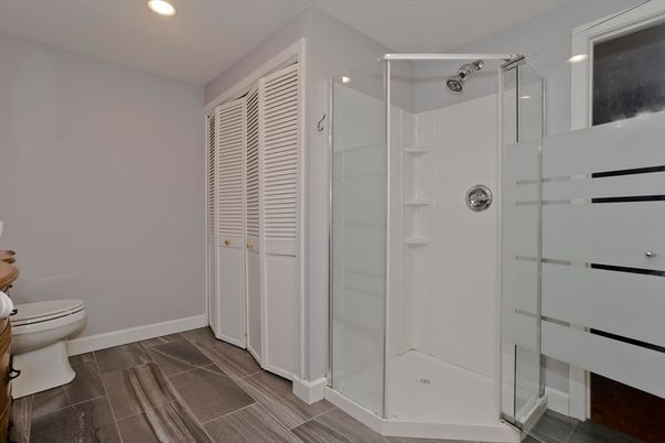 Bathroom, Glass Shower, Interior, Recessed Lighting, Wood Texture Flooring