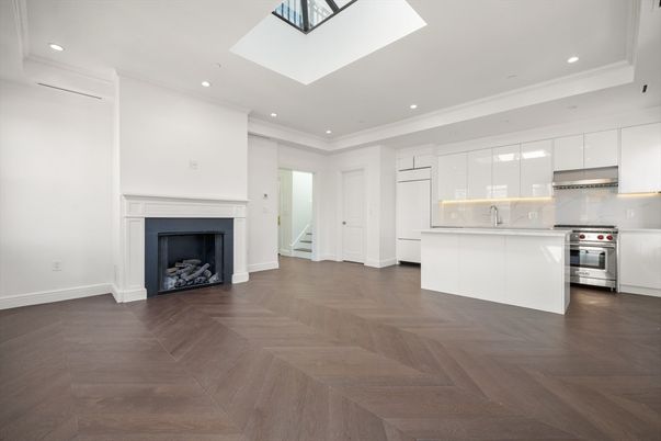 Fireplace, Interior, Kitchen, Recessed Lighting, Stainless Steel Appliances, Wood Texture Flooring