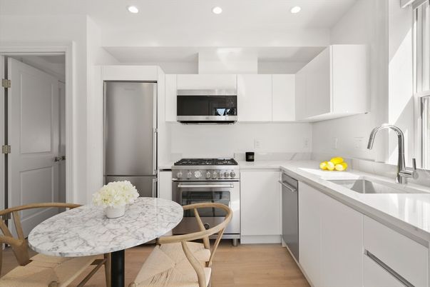 Dining room, Interior, Kitchen, Recessed Lighting, Stainless Steel Appliances, Wood Texture Flooring