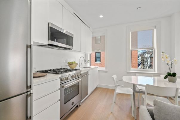 Dining room, Interior, Kitchen, Recessed Lighting, Stainless Steel Appliances, Wood Texture Flooring