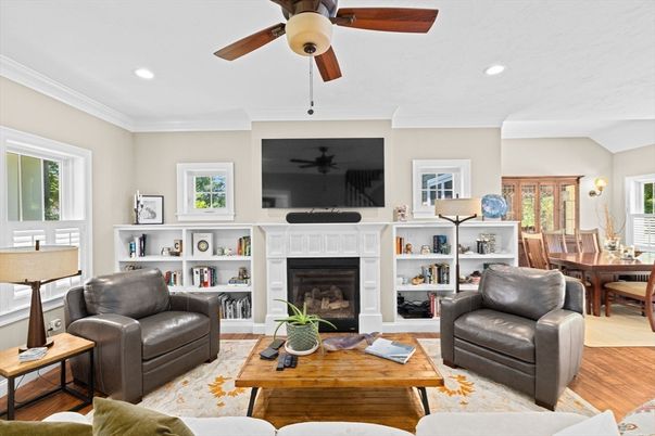 Dining room, Fireplace, Interior, Living room, Recessed Lighting, Wood Texture Flooring