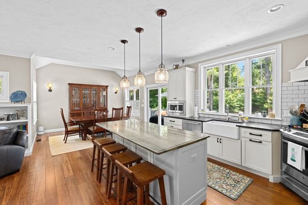 Dining room, Interior, Kitchen, Pendant Lights, Recessed Lighting, Stainless Steel Appliances, Wood Texture Flooring