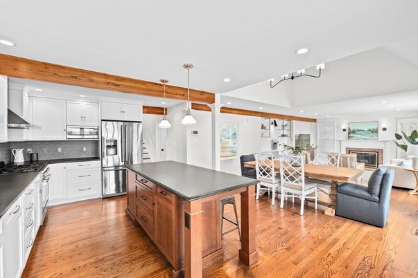 Dining room, Fireplace, Interior, Kitchen, Living room, Pendant Lights, Recessed Lighting, Stainless Steel Appliances, Wood Texture Flooring