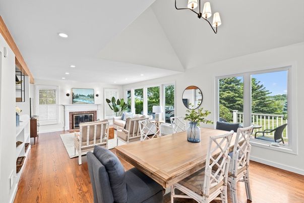 Dining room, Fireplace, Interior, Living room, Recessed Lighting, Wood Texture Flooring