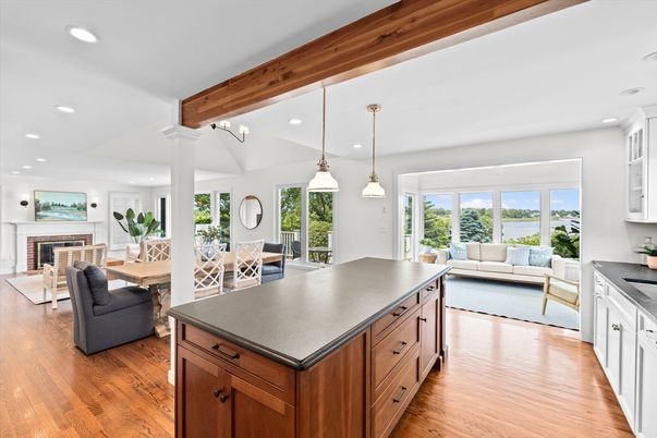 Dining room, Fireplace, Interior, Kitchen, Living room, Pendant Lights, Recessed Lighting, Water, Wooden Beams, Wood Texture Flooring