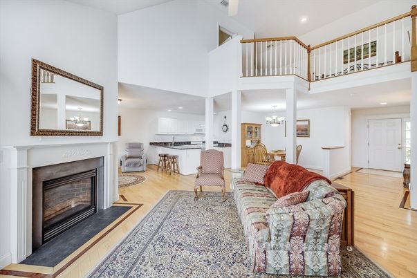 Chandelier, Dining room, Fireplace, Interior, Living room, Recessed Lighting, Wood Texture Flooring