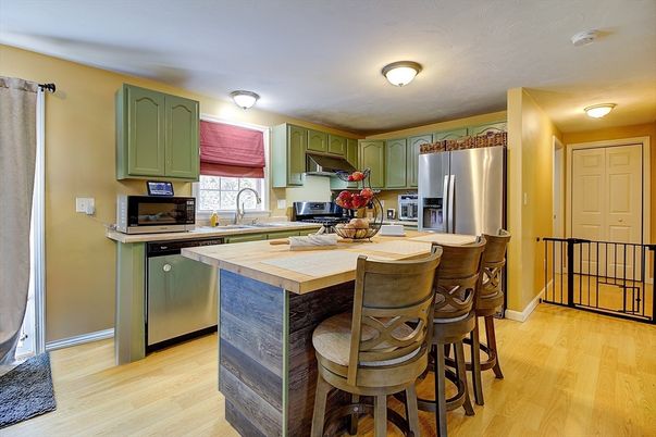 Interior, Kitchen, Stainless Steel Appliances, Tile Countertops, Wood Texture Flooring