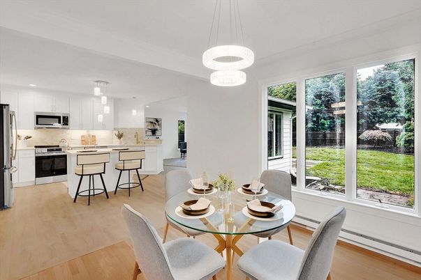 Dining room, Interior, Kitchen, Pendant Lights, Recessed Lighting, Stainless Steel Appliances, Wood Texture Flooring
