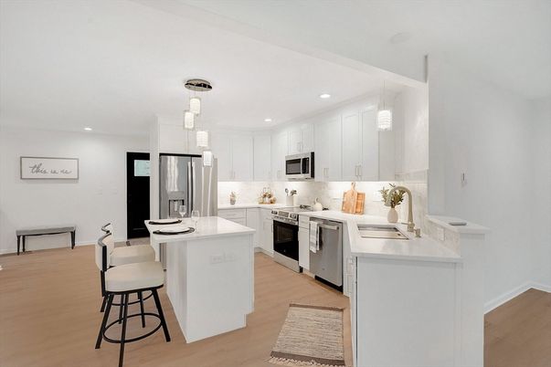 Interior, Kitchen, Pendant Lights, Recessed Lighting, Stainless Steel Appliances, Wood Texture Flooring