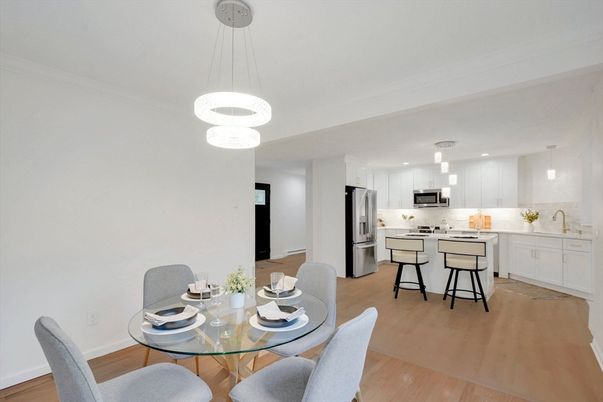 Dining room, Interior, Kitchen, Pendant Lights, Recessed Lighting, Stainless Steel Appliances, Wood Texture Flooring
