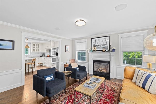 Fireplace, Interior, Kitchen, Living room, Pendant Lights, Recessed Lighting, Stainless Steel Appliances, Wood Texture Flooring