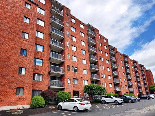 Exterior, Facade, Brick Facade, Condo Building