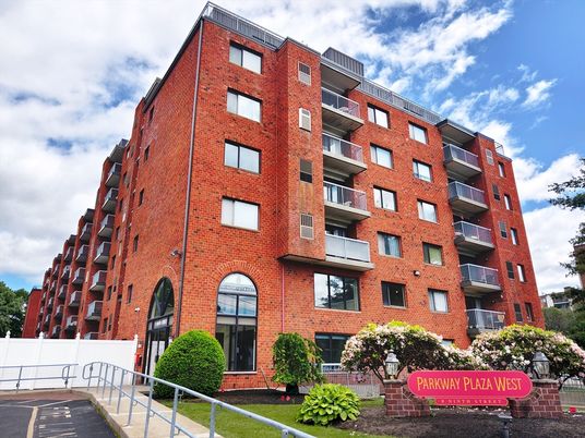 Exterior, Facade, Brick Facade, Condo Building