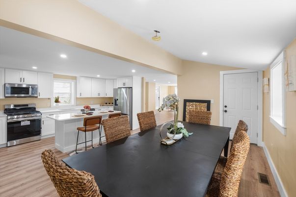Dining room, Interior, Kitchen, Recessed Lighting, Stainless Steel Appliances, Wood Texture Flooring