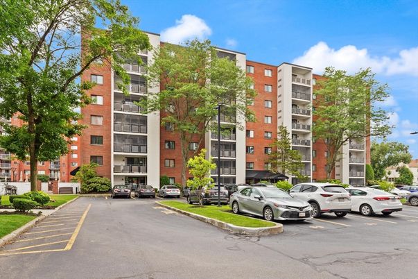 Exterior, Facade, Brick Facade, Condo Building