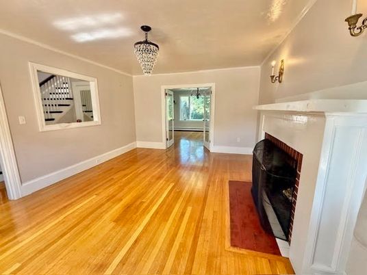 Chandelier, Empty room, Fireplace, Interior, Wood Texture Flooring
