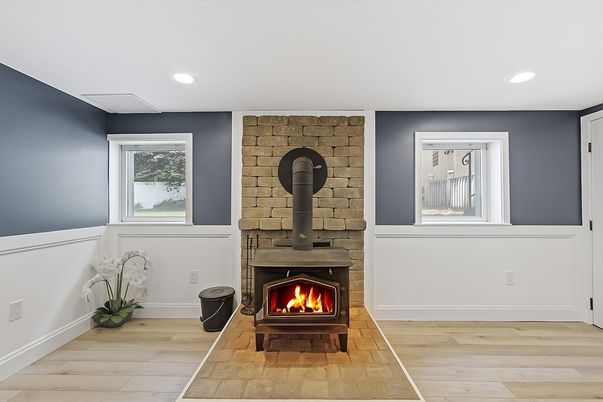 Fireplace, Interior, Recessed Lighting, Stone Walls, Wood Texture Flooring