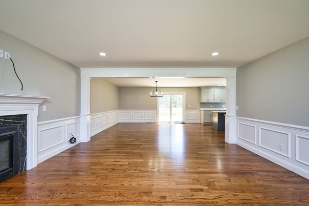 Empty room, Fireplace, Interior, Kitchen, Pendant Lights, Recessed Lighting, Wood Texture Flooring
