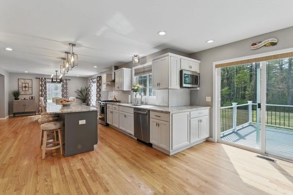Dining room, Interior, Kitchen, Pendant Lights, Recessed Lighting, Stainless Steel Appliances, Wood Texture Flooring