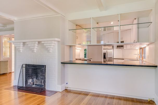 Fireplace, Interior, Kitchen, Stainless Steel Appliances, Wood Texture Flooring