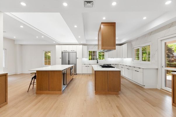 Interior, Kitchen, Marble Walls, Recessed Lighting, Stainless Steel Appliances, Wood Texture Flooring