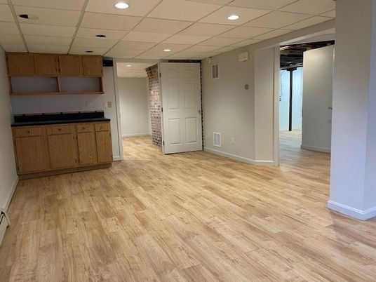 Empty room, Interior, Recessed Lighting, Stone Walls, Wood Texture Flooring