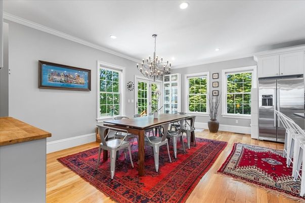 Chandelier, Dining room, Interior, Kitchen, Recessed Lighting, Stainless Steel Appliances, Wood Texture Flooring