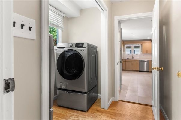 Interior, Kitchen, Recessed Lighting, Washer, Wood Texture Flooring