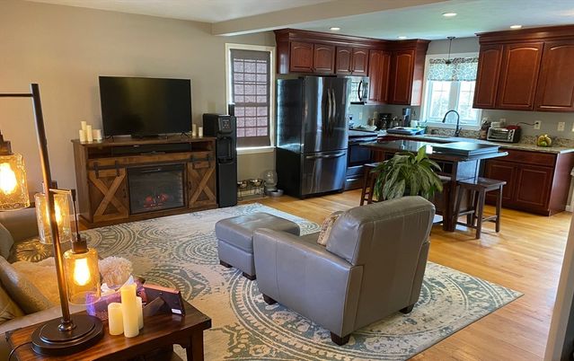 Fireplace, Interior, Kitchen, Living room, Recessed Lighting, Wood Texture Flooring