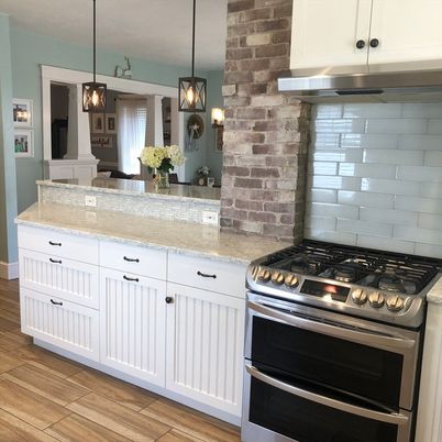 Interior, Kitchen, Pendant Lights, Stainless Steel Appliances, Stone Walls, Wood Texture Flooring