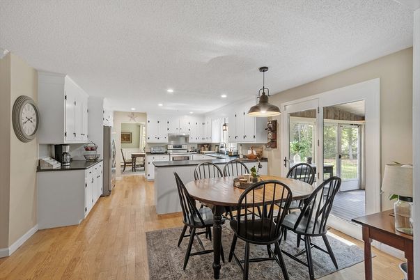 Dining room, Interior, Kitchen, Pendant Lights, Recessed Lighting, Stainless Steel Appliances, Wood Texture Flooring
