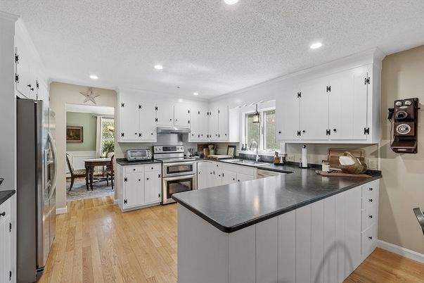 Dining room, Interior, Kitchen, Recessed Lighting, Stainless Steel Appliances, Wood Texture Flooring