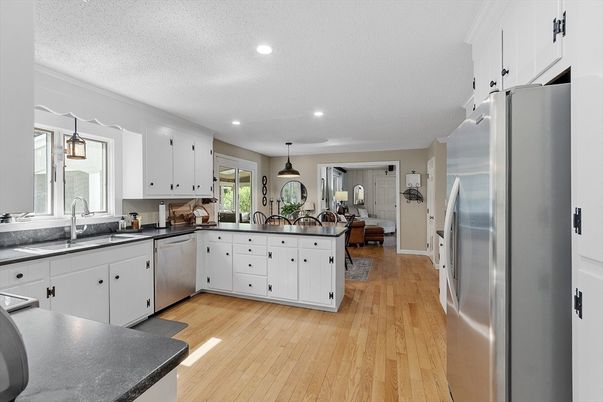 Interior, Kitchen, Pendant Lights, Recessed Lighting, Stainless Steel Appliances, Wood Texture Flooring