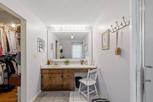 Bathroom, Dual Sink Vanities, Interior, Walk-in Closets, Wood Texture Flooring